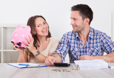 Image of Couple Saving Money
